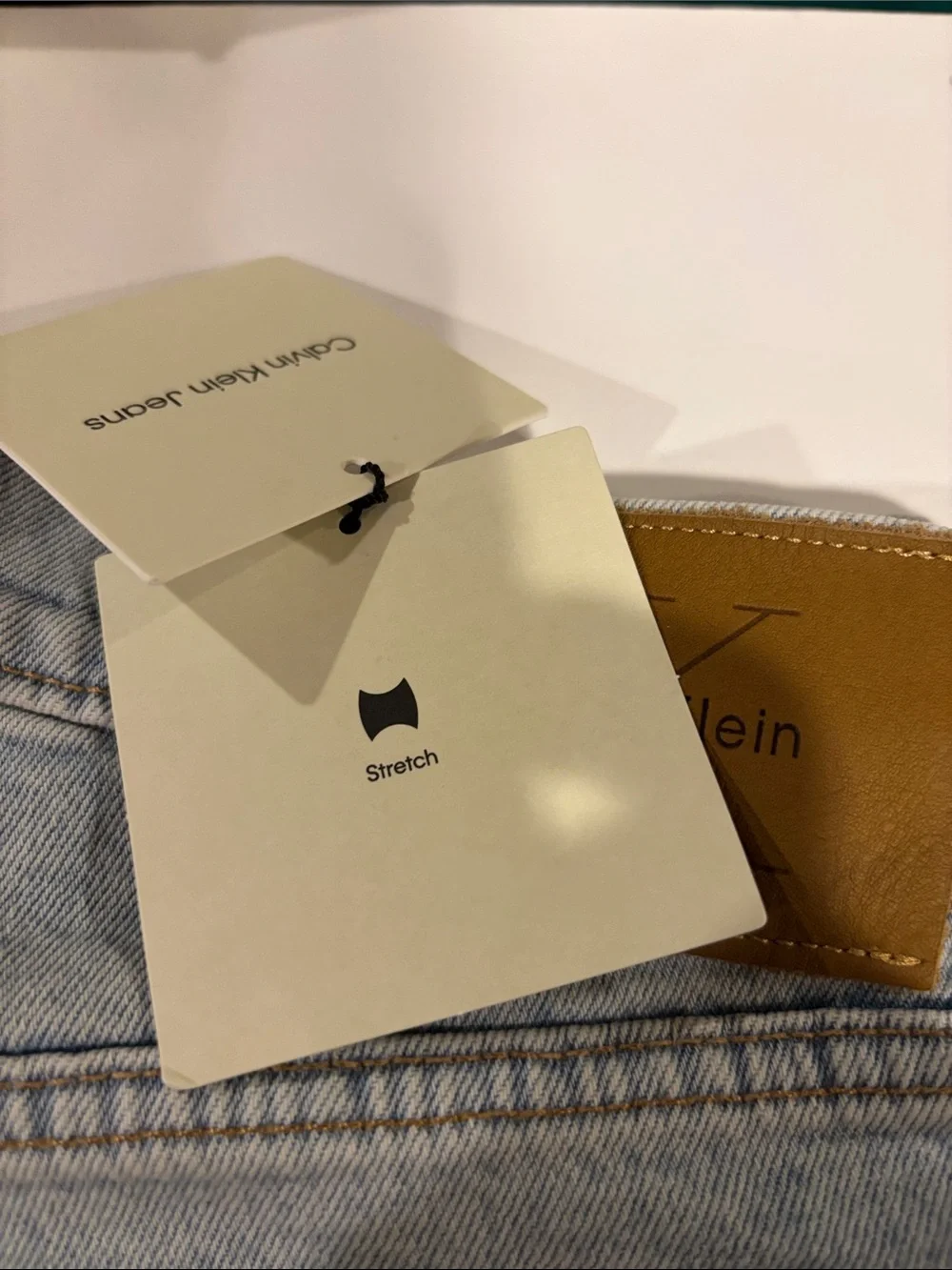 Calvin Klein Light Wash Denim Jeans with Tan Leather Patch - Picture 6 of 10